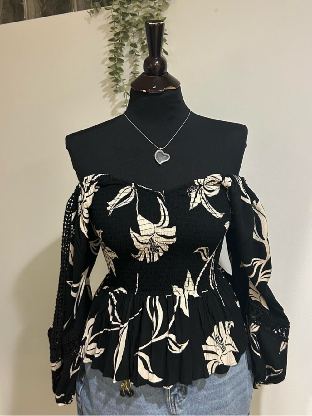 Angie Black and Cream Off-Shoulder Floral Peplum Long Sleeve Top